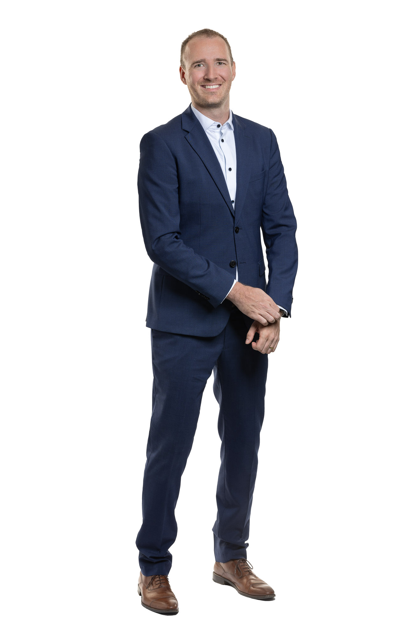 Patrick Merz in a blue suit
